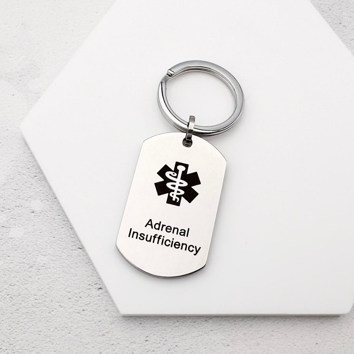 stainless steel keychain with star of life medical symbol and 'Adrenal Insufficiency' text