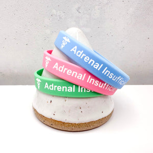 set of 3 silicone adrenal insufficiency medical alert wristbands in sky, pink, and mint