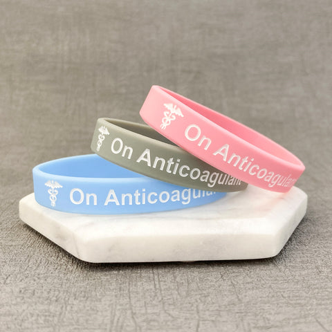 anticoagulant awareness bands pink grey sky