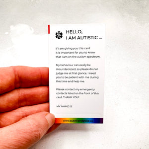 Back of autism wallet card explaining autism spectrum and behaviour with space for name and medical info