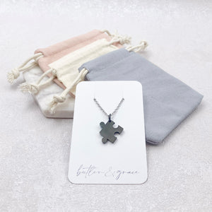 autistic jigsaw necklace black gift pouch