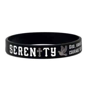 A black silicone wristband featuring the word 'SERENITY' in white and grey lettering