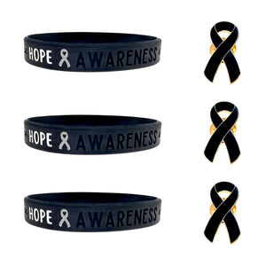 set of 3 black silicone wristbands engraved with ‘Hope & Awareness’ besides 3 black enamel ribbon pins