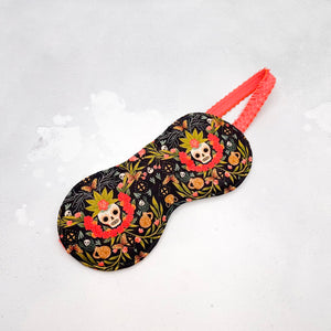 Sleep mask with skull and floral design inspired by day of the dead