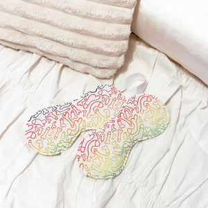 two eye masks with a colourful male anatomy pattern 