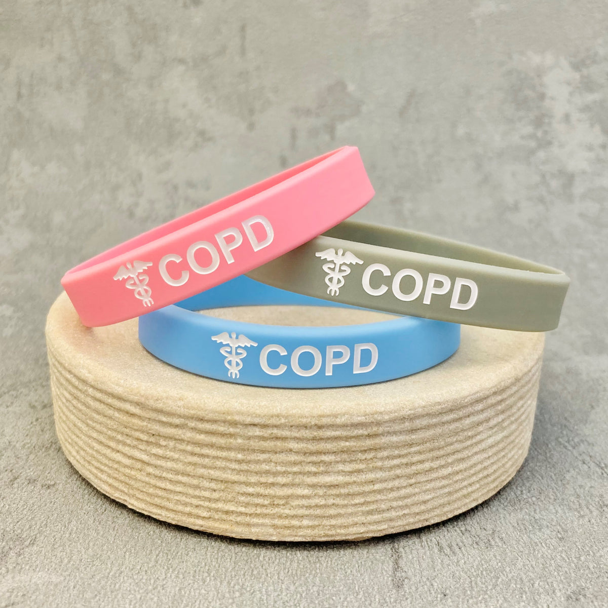 copd wristbands pink grey sky