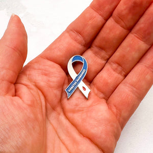 Diabetes Awareness Ribbon Pin Held in Hand for Size Reference