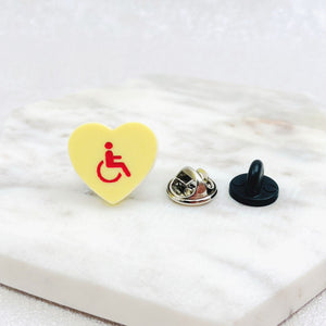 disability awareness pin access symbol