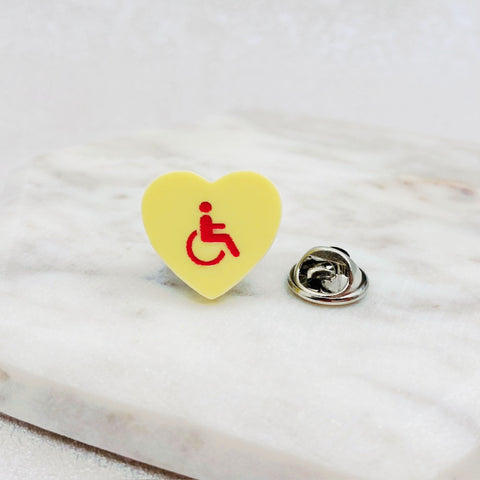 disability awareness pin yellow heart badge
