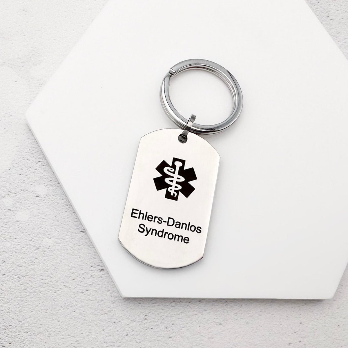 stainless steel keychain with star of life medical symbol and 'Ehlers-Danlos Syndrome' text