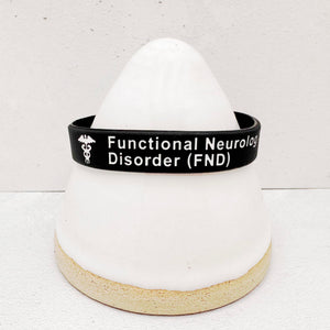 Close-up of a FND wristband showing clear medical identification text