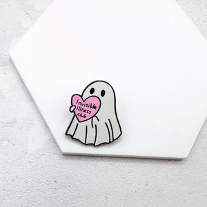 Ghost pin holding a pink heart with 'Invisible Illness Club' text on a white background