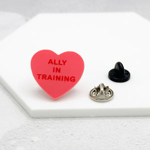 lgbt ally in training pin present