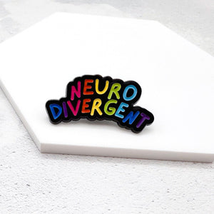rainbow enamel pin with 'Neurodivergent' text