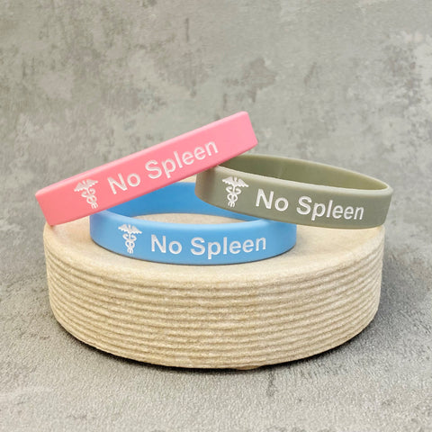 no spleen wristbands pink grey sky