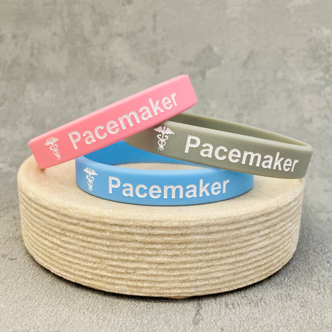 pacemaker wristbands pink grey sky