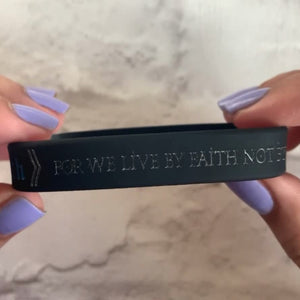 Black silicone 2 Corinthian 5:7 Bible verse bracelet shown from multiple angles