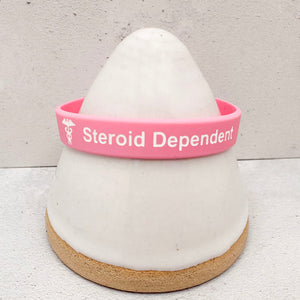 Flexible waterproof medical ID wristband for steroid dependent users in pink