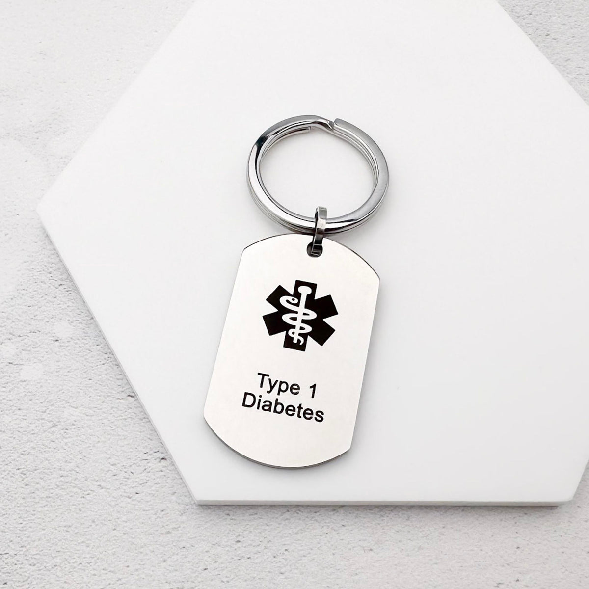 stainless steel keychain with star of life medical symbol and 'Type 1 Diabetes' text