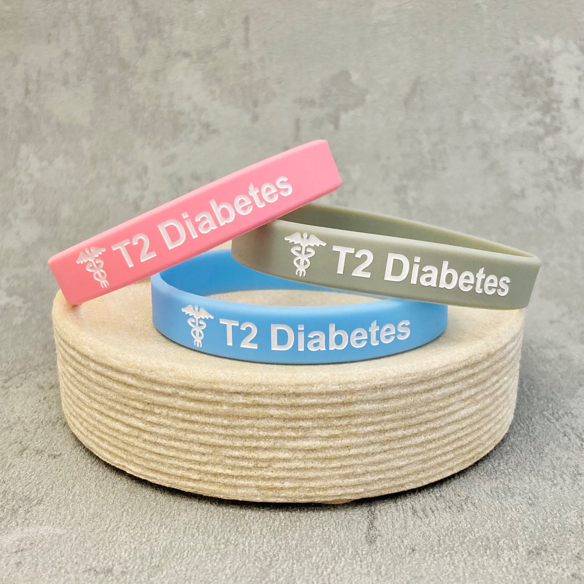 type 2 diabetes wristband pink grey sky