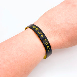 grid coordinates personalised wristband black yellow gift