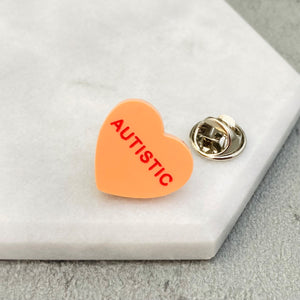 heart pin for autism awareness orange
